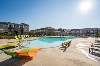 Resort-style pool with sundeck